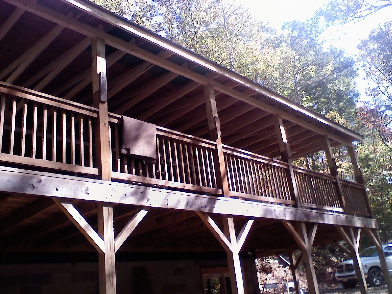 Timber framing under a new elevated porch and deck — Roof Leak Repair in Dannemora by Roofing Brothers